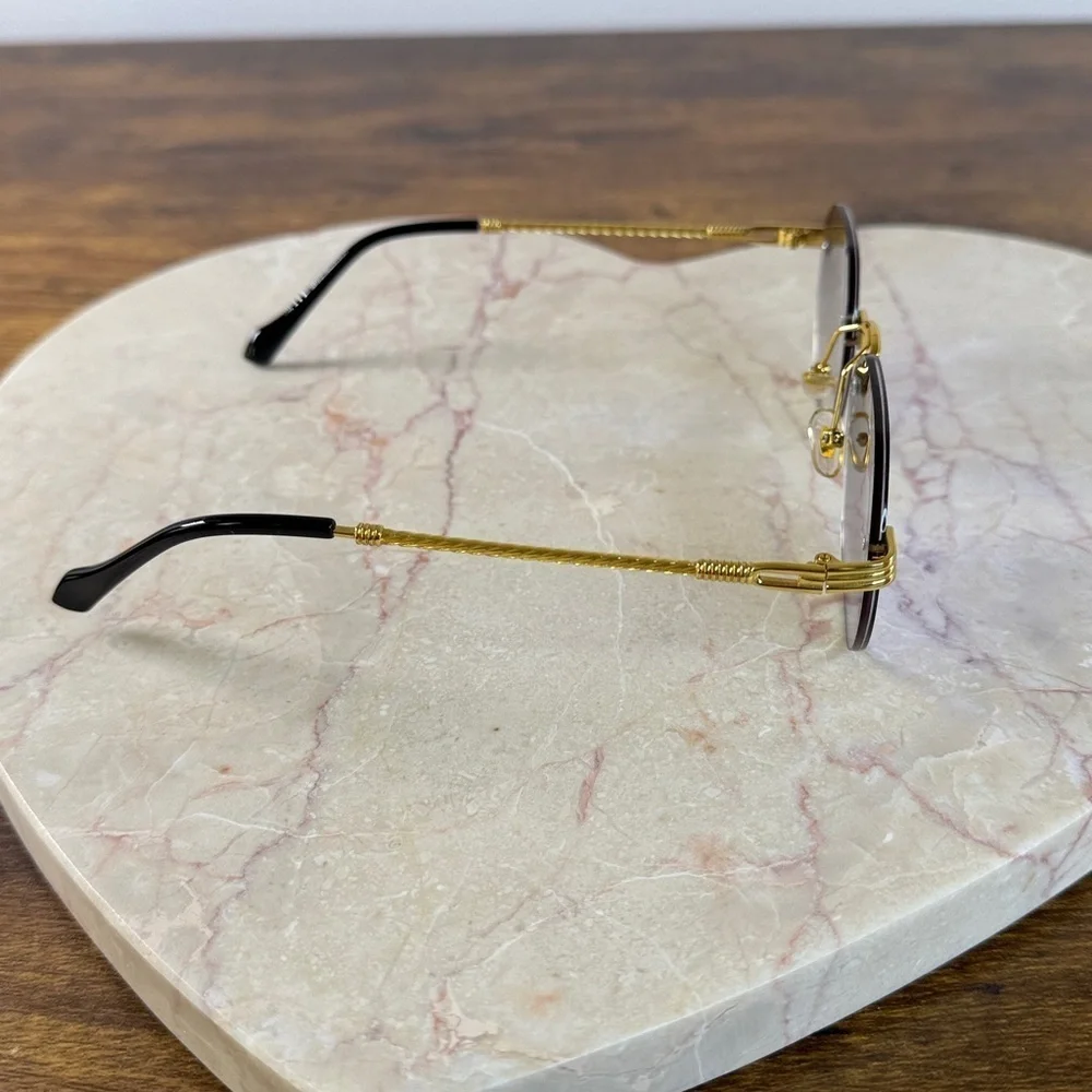 Gold and Blue Rimless Sunglasses